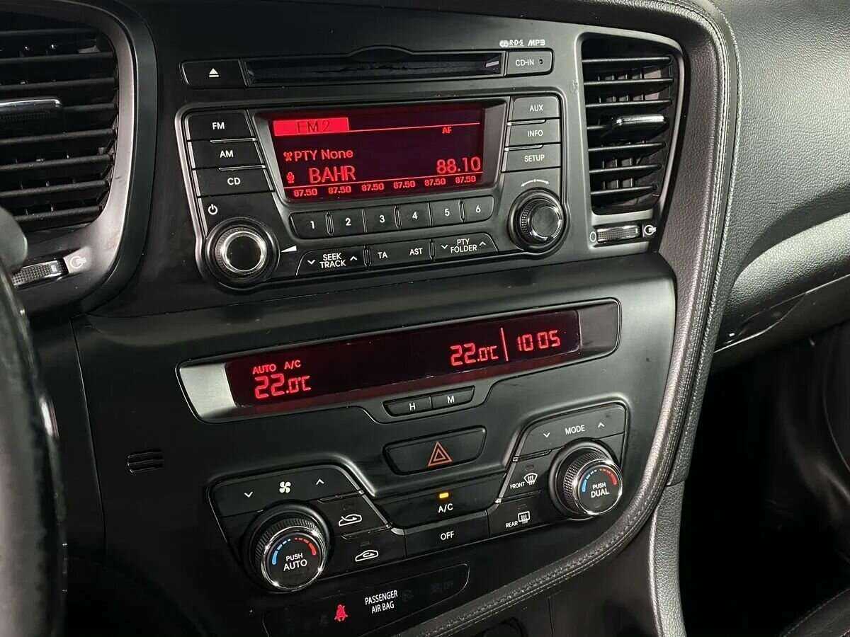 Б/У Киа Оптима 2013 года. Фото: #11