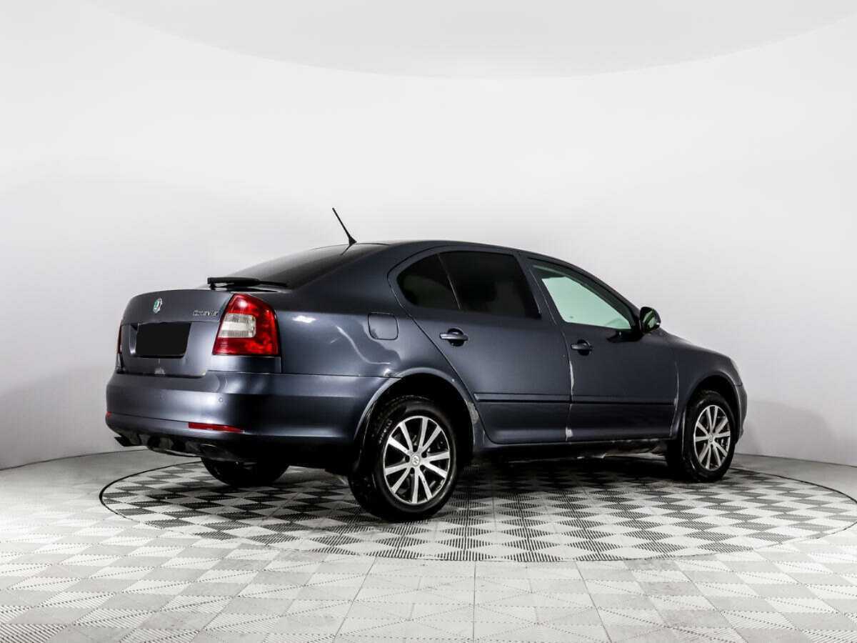 Б/У Шкода Октавия 2012 года. Фото: #4