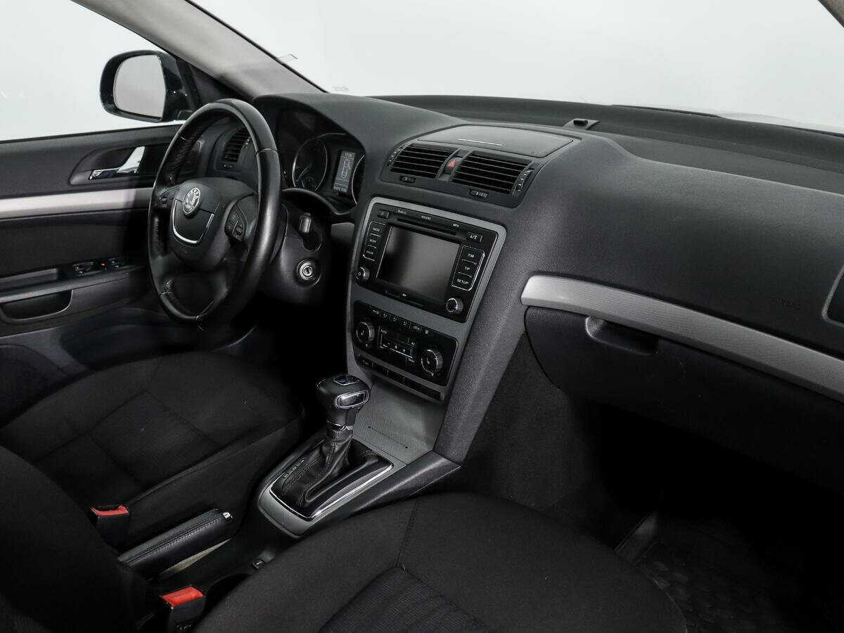 Б/У Шкода Октавия 2013 года. Фото: #11