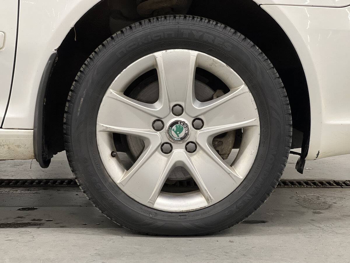 Б/У Шкода Октавия 2012 года. Фото: #16